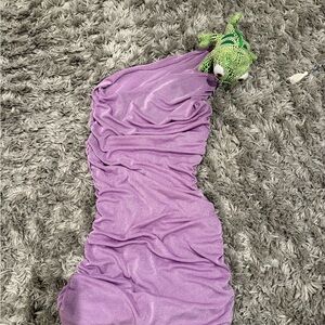 Purple Knit Blanket with Green Dinosaur Toy